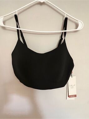 Black light support active wear top in Medium.